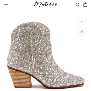 Brand new. Still in plastic and box! Stunning boots!